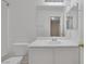 Bright bathroom featuring a clean white sink and toilet at 9100 Hombard Ave, Las Vegas, NV 89148