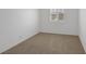 Simple bedroom with a window providing natural light at 9100 Hombard Ave, Las Vegas, NV 89148