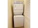 Convenient laundry area with stacked washer and dryer at 9100 Hombard Ave, Las Vegas, NV 89148