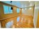 Spacious living room with gleaming wood floors and bright natural light at 9100 Hombard Ave, Las Vegas, NV 89148