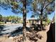 Playground with swingsets and outdoor seating at 9100 Hombard Ave, Las Vegas, NV 89148