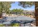 Community playground with swing set and seating at 9100 Hombard Ave, Las Vegas, NV 89148