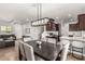 Spacious living area features an open floor plan including the living room, dining area and kitchen at 1034 Fish Pond Ave, Henderson, NV 89014