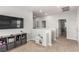 Loft area featuring a TV, playroom, and bright neutral color scheme at 1034 Fish Pond Ave, Henderson, NV 89014