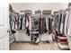 Spacious walk-in closet with ample storage and organization system at 1034 Fish Pond Ave, Henderson, NV 89014