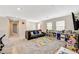 Cozy loft space featuring comfortable seating, bright playroom elements, and natural light at 10650 Dryades Ave, Las Vegas, NV 89166
