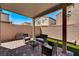 Outdoor patio with a lounge area and chairs, perfect for entertaining at 10650 Dryades Ave, Las Vegas, NV 89166