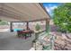 Covered back patio with room for dining and entertaining, plus nice landscaping at 1105 Winwood St, Las Vegas, NV 89108