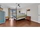 Comfortable bedroom with natural light, and hardwood flooring, perfect for relaxation at 1105 Winwood St, Las Vegas, NV 89108