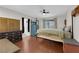 Cozy bedroom with hardwood floors, a ceiling fan and ensuite bathroom at 1105 Winwood St, Las Vegas, NV 89108