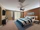 Cozy bedroom with a modern bed set and views from the windows at 1177 Twinkling Meadows Dr, Henderson, NV 89012