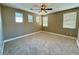 Large bonus room with multiple windows and a ceiling fan at 1177 Twinkling Meadows Dr, Henderson, NV 89012