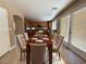 Inviting dining room next to a fully equipped kitchen with stainless steel appliances at 1177 Twinkling Meadows Dr, Henderson, NV 89012