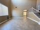 Large living room featuring a staircase and tile flooring at 1177 Twinkling Meadows Dr, Henderson, NV 89012