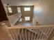 Looking down the stairs from the open floor at 1177 Twinkling Meadows Dr, Henderson, NV 89012