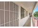 Exterior of condo with door 204, balcony, and hallway at 1381 E University Ave # 204, Las Vegas, NV 89119