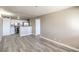 The living space is connected to the kitchen and offers laminate flooring at 1381 E University Ave # 204, Las Vegas, NV 89119