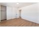 Empty bedroom with hardwood floors and a closet with sliding doors at 1648 J St, Las Vegas, NV 89106
