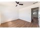 Bright bedroom with wood flooring and a ceiling fan at 1648 J St, Las Vegas, NV 89106