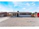 Inviting single-story home with a well-maintained gravel yard and clean exterior at 1648 J St, Las Vegas, NV 89106