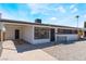 Welcoming single-story home with a clean exterior and easy-to-maintain gravel landscape at 1648 J St, Las Vegas, NV 89106