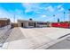 Lovely one-story home with a simple gravel front yard and a freshly painted exterior at 1648 J St, Las Vegas, NV 89106