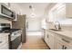 Modern kitchen featuring stainless steel appliances, sleek countertops, and an open layout for easy flow at 1648 J St, Las Vegas, NV 89106