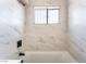 The bathroom offers a sleek window and shower combination at 1648 J St, Las Vegas, NV 89106