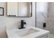 Modern bathroom vanity with sleek faucet and mirror at 1648 J St, Las Vegas, NV 89106