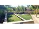 Relaxing backyard with a Bocce Ball court, perfect for outdoor enjoyment and entertaining at 2140 Desert Peak Rd, Las Vegas, NV 89134