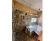 Modern tiled shower and separate soaking tub with seamless glass shower doors at 2140 Desert Peak Rd, Las Vegas, NV 89134