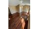 Large bedroom with vaulted ceilings, ceiling fan, and hardwood floors at 2140 Desert Peak Rd, Las Vegas, NV 89134