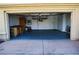 Spacious two-car garage with ample storage and work bench space at 2140 Desert Peak Rd, Las Vegas, NV 89134