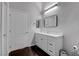 Updated bathroom featuring a modern vanity with storage, sleek fixtures, and dark wood flooring at 2305 W Horizon Ridge Pkwy # 3921, Henderson, NV 89052