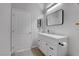 Bathroom with modern vanity, rectangular mirror, and a closed toilet at 2305 W Horizon Ridge Pkwy # 3921, Henderson, NV 89052