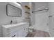 Bathroom with modern vanity, mirror, and a shower over the tub at 2305 W Horizon Ridge Pkwy # 3921, Henderson, NV 89052