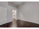A bedroom with hard wood floors and entrance to a walk-in closet at 2305 W Horizon Ridge Pkwy # 3921, Henderson, NV 89052