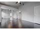 A bedroom with sleek hard wood floors and an entrance to the bathroom at 2305 W Horizon Ridge Pkwy # 3921, Henderson, NV 89052