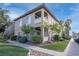 Two-story condo building with well-kept landscaping and multiple balconies at 2305 W Horizon Ridge Pkwy # 3921, Henderson, NV 89052
