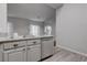 This contemporary kitchen features stainless steel appliances, granite counters, and bright white cabinets at 2305 W Horizon Ridge Pkwy # 3921, Henderson, NV 89052