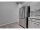 This contemporary kitchen is upgraded with stainless steel appliances and white cabinets and has lots of counter space at 2305 W Horizon Ridge Pkwy # 3921, Henderson, NV 89052