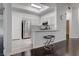Modern kitchen featuring stainless steel appliances, a breakfast bar, and white cabinets at 2305 W Horizon Ridge Pkwy # 3921, Henderson, NV 89052