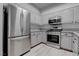 This contemporary kitchen is upgraded with stainless steel appliances and white cabinets and has lots of counter space at 2305 W Horizon Ridge Pkwy # 3921, Henderson, NV 89052