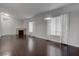 This spacious living room has dark hardwood floors, a fireplace, and lots of natural light at 2305 W Horizon Ridge Pkwy # 3921, Henderson, NV 89052