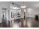 Spacious living room boasts a view into the kitchen, featuring hardwood floors and recessed lighting at 2305 W Horizon Ridge Pkwy # 3921, Henderson, NV 89052
