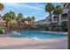 Resort-style pool with ample lounge chairs and lush landscaping in a community setting at 2305 W Horizon Ridge Pkwy # 3921, Henderson, NV 89052