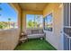 Cozy balcony featuring artificial turf and bench at 251 S Green Valley Pkwy # 3222, Henderson, NV 89012