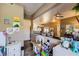 View of a bedroom, showing a living room and kitchen area at 251 S Green Valley Pkwy # 3222, Henderson, NV 89012
