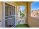 Condo front door with security screen and artificial turf outside at 251 S Green Valley Pkwy # 3222, Henderson, NV 89012
