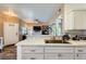 Updated kitchen with stainless steel appliances and open view to the living room, ideal for entertaining at 251 S Green Valley Pkwy # 3222, Henderson, NV 89012
